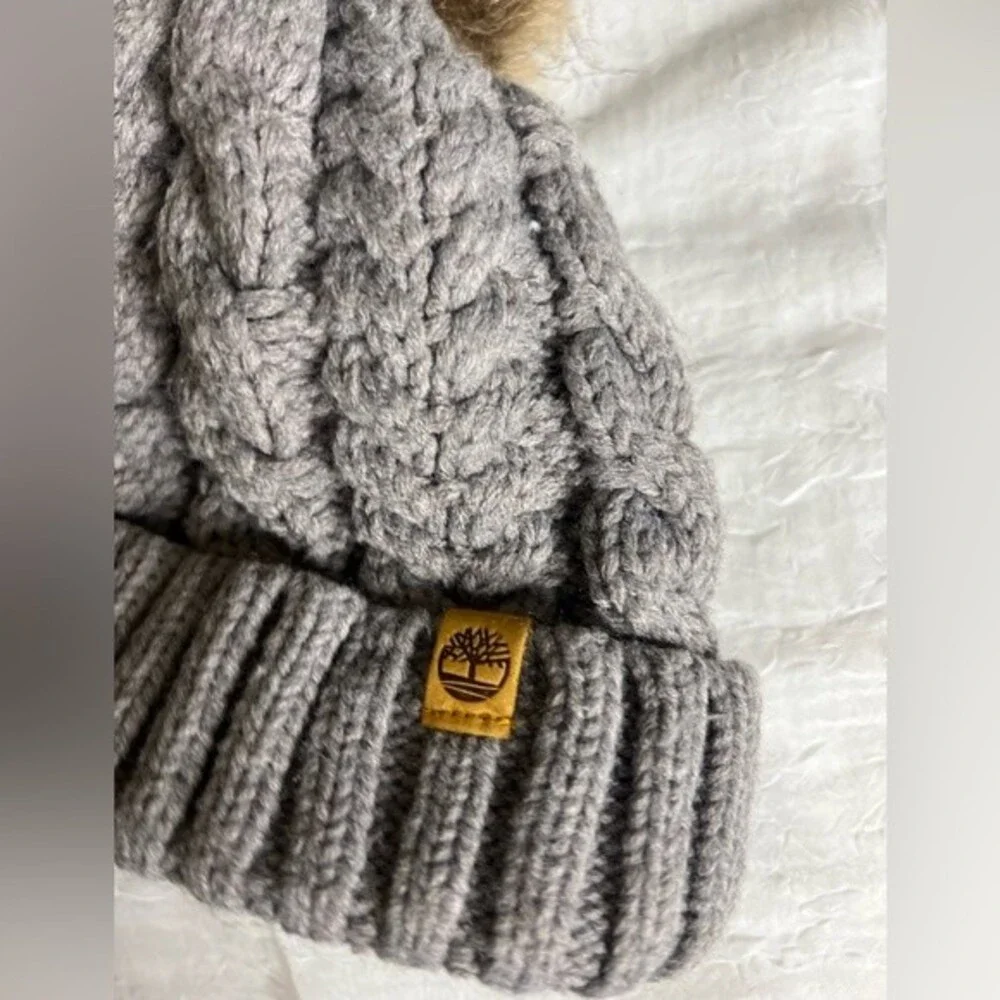 Timberland Women`s Cable Knit Cuff Pom Beanie  Fleece lined Color Gray